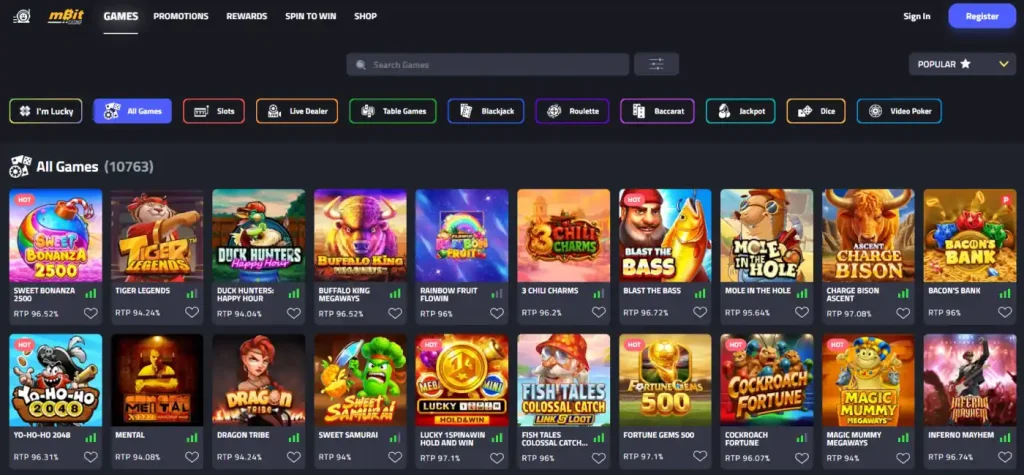 mBit casino lobby with game categories and rows of playable titles